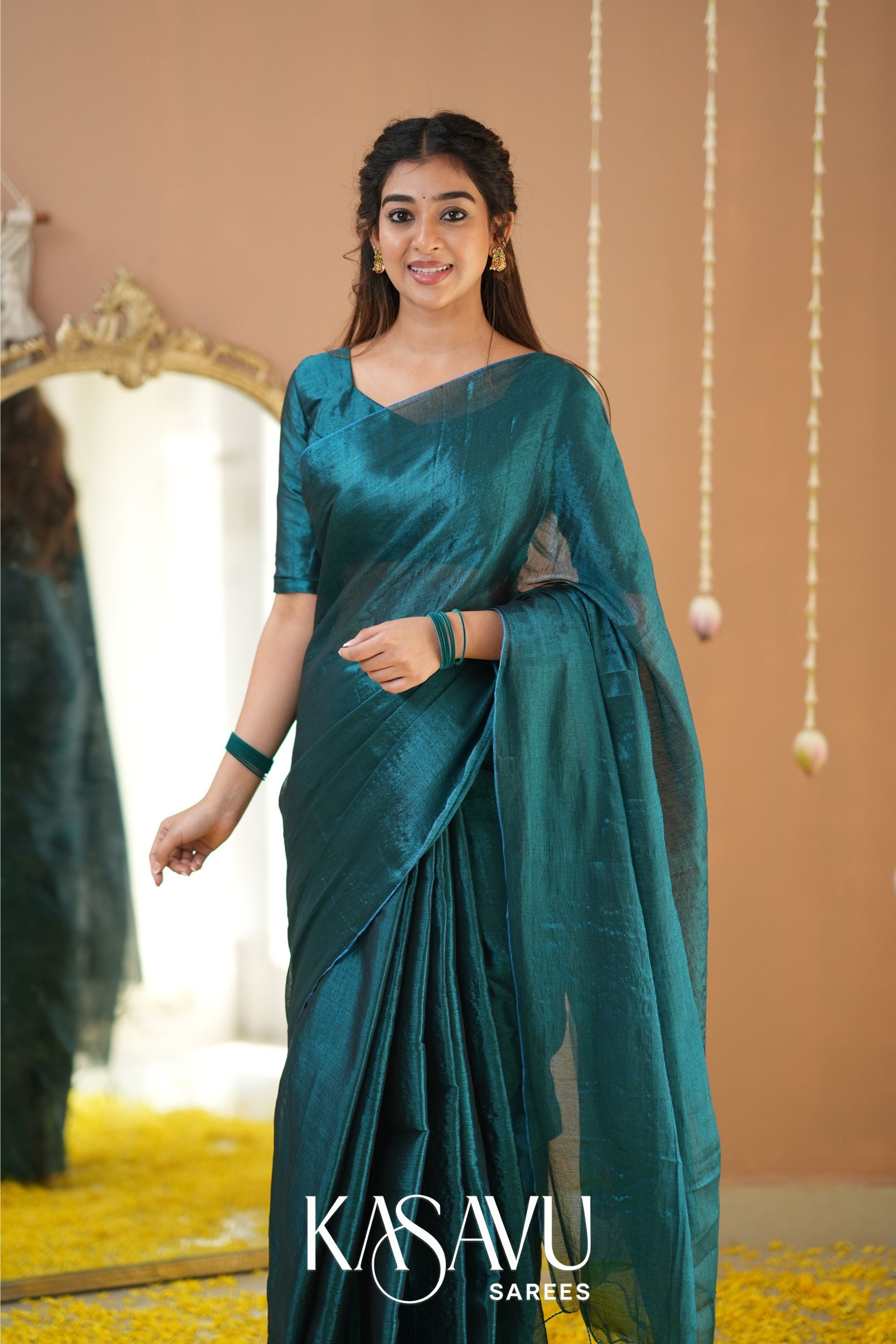 Kasavu Teal Green Tissue Cotten Saree