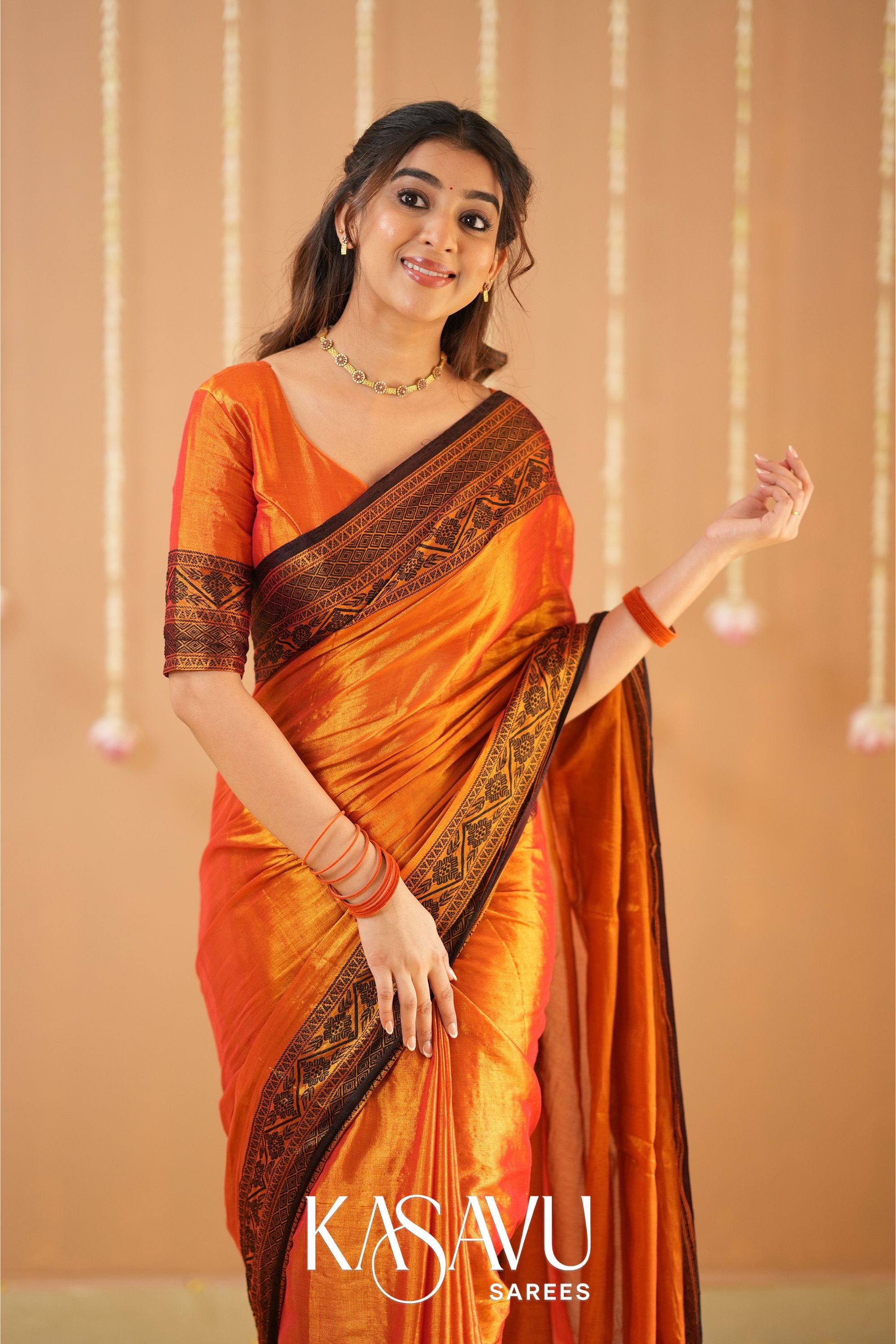 Kasavu Orange Tissue Cotten Saree